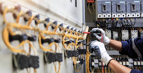 Professional Electrician technician working in Lake Belvedere Estates, FL